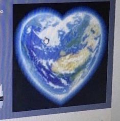 an image of the earth in a heart shape