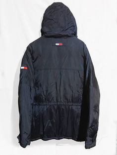 Vintage 90s Tommy Hilfiger Goose Down Proof Hooded Parka jacket Block Logo Spell Out Multi Pocket Navy Blue Size XL Condition: Normal Trace of Use Overall Good Size: X-Large lenght : 31,5 Pit to Pit: 27.5 Arms: 26 Any questions just ask! Please keep in mind that colours from the pictures may vary because of your screen. I SEND WITH TRACKING NUMBER! If any item is lost or damaged in transit I will make a claim with the Post Office but refunds will not be given until the claim has been processed. Blue Parka With Pockets For Streetwear, Blue Streetwear Parka With Pockets, 90s Style Outerwear With Pockets For Streetwear, 90s Style Streetwear Outerwear With Pockets, Sporty Hooded Jacket With Pockets For Cold Weather, 90s Style Outerwear With Pockets For Winter, 90s Winter Outerwear With Drawstring Hood, Sporty Parka For Cold Weather With Pockets, Sporty Cold Weather Parka With Pockets