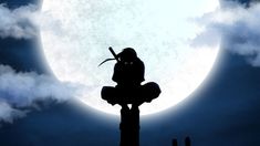 a person sitting on top of a wooden pole in front of a full moon