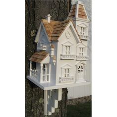 ThereisnothingmodestaboutthisAvianVictorianMansion.ToppedwithpineshinglesandpatternedfromourbestsellingManorBirdhouse(HB2014),thisstylehasintricatedetailsincludingwindowboxtrim,miniaturebirdhousesandmultiplerooflines.Comeswitharemovablebackwallforeasycleaning.Thisstylewillrequireamountingpostorcanbenicelymatchedwithoneofourpedestals.Bracketincluded.ItemDimensions:17.5"Hx10"Wx9"D Victorian Birdhouses, Purple Martin House, Large Bird Houses, Victorian Manor, Victorian Mansion, Wooden Bird Houses, Martin House, Bird House Kits, Birdhouse Designs