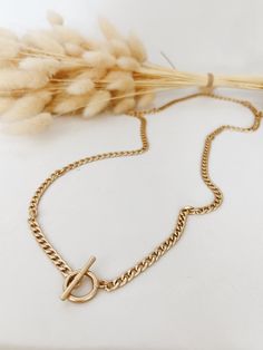 This is a thing gold chain necklace that can either be worn very long or wrapped around twice to be a shorter double chain. Attaches by a toggle. Double Chain, Gold Chain Necklace, A Thing, Wrap Around, Gold Chain, Gold Chains, Chain Necklace, Chain, Gold