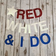 red, white and i do sign on wooden planks with stars above the word