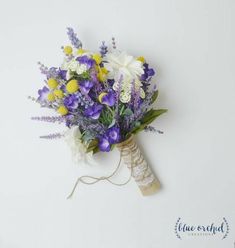 a bouquet of flowers is tied up on a white background with the words flower shop written below it