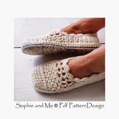 someone is wearing crocheted slippers with holes on them