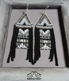 These gray and black fringe beaded earrings are made of high-quality Czech beads and strong synthetic thread. They are elegant, fashionable, and highly versatile, suitable for everyday wear. Features: Sterling silver components Color: gray, white, black. This item is currently in stock. You must be completely satisfied. If you find merchandise unsatisfactory for any reason, return it within 10 days and your money will be refunded without questions. These earrings in gold color https://www.etsy.c Black Beaded Fringe Earrings With Round Beads, Black Beaded Earrings With Round Beads And Fringe, Black Fringe Dangle Chandelier Earrings, Elegant Black Beaded Fringe Chandelier Earrings, Black Beaded Fringe Dangle Tassel Earrings, Black Beaded Fringe Tassel Dangle Earrings, Black Beaded Fringe Tassel Earrings As Gift, Black Beaded Fringe Tassel Drop Earrings, Black Beaded Tassel Earrings With Round Beads