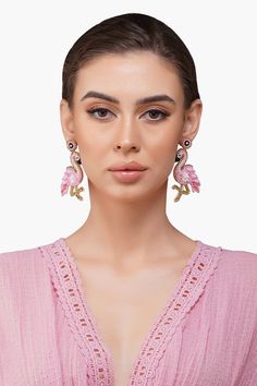 Light up any ensemble with these playful Flamingo Beaded Earrings. Handcrafted from shades of pink, these unique earrings are sure to make a statement. Each pair is made by skilled artisans who take absolute pride in their work. The beaded design is light and comfortable to wear, making them the perfect accessory for any occasion. Add a touch of fun to your wardrobe with these beautiful earrings. A staple for happy vacations and dancing nights. Flamingo Shaped Beaded Earrings Handcrafted in shad Happy Vacation, Animal Print Jumpsuit, Sweet Escape, Green Beads, Yellow And Green, Shades Of Pink, Bag Dress, Small Accessories, Green Bead