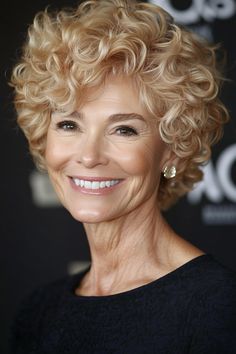 Click for More ➡️ | Save for Later ❤️For naturally curly hair, this honey blonde pixie embraces texture while maintaining shape, resulting in a soft, radiant appearance. (Honey Blonde Curly Pixie - Short Pixie Haircuts For Older Women)