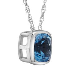 With a modern bezel setting, this cushion-cut blue topaz pendant bestows icy beauty with enduring energy. The 10K white gold accessory takes a simple style and makes it shine. Hit the mark with a go-to for a December birthstone gift or a just-because surprise. | Blue Topaz Pendant Necklace with Cushion Cut | 10K White Gold | Size 18" | Layering & Stacking Modern Blue Topaz Jewelry With Bezel Setting, Modern Cushion Cut Jewelry With Bezel Setting, Modern Cushion Cut Bezel Set Jewelry, Modern Cushion Cut Jewelry For Gift, Modern Jewelry For Gift Occasions, Modern Jewelry With Diamond Cushion Cut, Modern Cushion Cut White Gold Jewelry, Blue Topaz Pendant Necklace, December Birthday Gifts