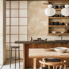 the kitchen is clean and ready for us to use it's natural wood accents