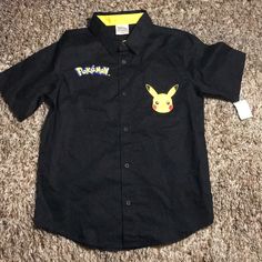 Black Short Sleeve Button Up Shirt Cute Black Short Sleeve Shirt, Anime Button Up Shirt, Pikachu Shirt, Pokemon Black, Pokemon Shirts, Black Pokemon, Hooded Flannel, Button Front Shirt, Short Sleeve Button Up