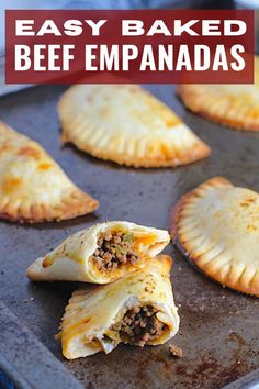 easy ground beef empanadas on a baking sheet with text overlay that reads easy ground beef empanadas