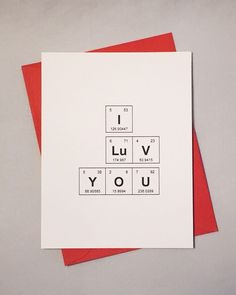 a greeting card with the words i love you spelled in black and white on it