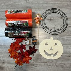 the supplies needed to make a halloween decoration include pumpkins, candy bars and other items