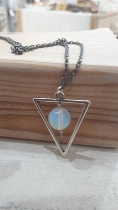 Silver triangle Triangle chain Unique triangle jwls Long chain triangle Long silver triangle Rose quartz triangle Unisex triangle Unisex pendant Long triangle chain Long silver necklace Silver long triangle Moonstone pendant Lava triangleThis handmade necklace has a long nickel free chain that in the end has a silver plated triangle! Inside the triangle is a seamy precious stone! You can choose between moonstone, turquoise, rose quartz, white coral and lava!↓↓↓ You can find more handmade necklac Minimalist Silver Pyramid Jewelry, Minimalist Triangle Metal Necklace, Silver Triangle Metal Necklace, Nickel-free Triangle Sterling Silver Jewelry, Handmade Triangle Sterling Silver Jewelry, Silver Triangle Jewelry For Gifts, Silver Triangle Jewelry Gift, Nickel-free Silver Triangle Jewelry, Handmade Sterling Silver Triangle Jewelry