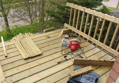 a wooden deck with tools on it