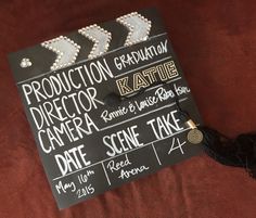 a black and white sign with some writing on it that says production director kate date