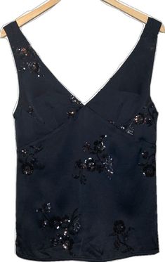 Black V-neck Tops With Floral Embroidery, Silk Embroidered Evening Tops, Zara Sleeveless Tops With Floral Embroidery, Zara Sleeveless Top With Floral Embroidery, Black Embroidered Silk Top, Embellished Silk V-neck Top, Zara Black Tops With Floral Embroidery, Black Floral Embroidery Tops For Evening, Elegant Embroidered Tops For Night Out