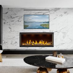 a modern living room with marble walls and fireplace