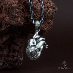 Anatomical Heart Pendant, Realistic Human Heart Necklace, Handmade 925 Silver Jewelry, Medical Necklace, Unique Gift for Him and Her Package included: Unisex Silver Necklace - Made to order Materials: 925 Sterling Silver Finish: Oxidized - Polished - Gold Plated  Chain Length: From 18 to 28 inches or No chain  Frequently Asked Questions: - Express Shipping. - Returns and exchanges are accepted within 7 days after delivery. - The buyer is responsible for any loss of value that may occur if the pr Heart-shaped Oxidized Sterling Silver Necklaces, Heart-shaped Sterling Silver Necklace With Oxidized Finish, Heart Shaped Sterling Silver Necklace With Oxidized Finish, Spiritual Sterling Silver Heart Charm Necklace, Heart-shaped Oxidized Jewelry Gift, Heart-shaped Oxidized Jewelry For Gifts, Unique Heart-shaped Sterling Silver Necklace, Heart Shaped Oxidized Necklace Perfect As A Gift, Unique Sterling Silver Necklace With Heart Charm