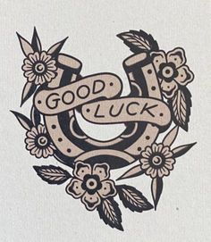 an old school tattoo design with flowers and the words good luck