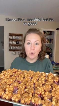 a woman holding a pan full of food with the words i know it's a mouthful but it's so good