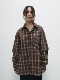 This oversized cotton shirt features a classic plaid pattern and button closures, offering a relaxed, comfortable fit. The design is elevated by contrasting sleeves, adding a modern twist to the traditional checkered style. The double-layered construction enhances the shirt’s structure and durability, making it a versatile piece for layering or wearing on its own. Combining timeless plaid with contemporary details, this shirt is perfect for adding a touch of effortless style to any outfit. Fabric: 80% CO, 20% PE Gender: UNISEX Made in UkraineModels parameters: Height 173 cm / Bust 85 cm / waist 60 cm / Hips 89 cm WOMEN XS S M L XL bust 80-84 85-89 90-94 95-99 100-104 waist 60-64 65-69 70-74 75-79 80-84 hips 82-86 87-91 92-96 97-101 102-106 MEN XS S M L XL bust 85-88 89-92 93-95 96-99 100-1 Plaid Pattern, Effortless Style, Cotton Shirt, Comfort Fit, Twist, Plaid, Fabric, How To Wear, Clothes