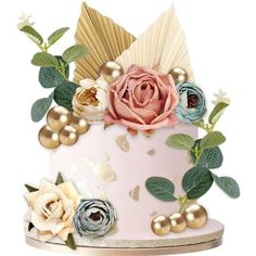 a pink cake decorated with flowers and leaves