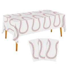 three baseball themed tablecloths and napkins on wooden legs with red stitching