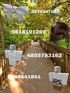 an image of a wooden bridge in the woods with numbers on it and two bears