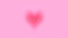 a heart shaped object on a pink background with the words love is in the air