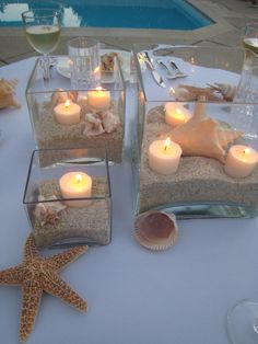 Seashore Table Beach Sand Centerpieces, Wedding Decorations Beach Theme, Beach Theme Party Table Decor, Wedding Beach Theme Decorations, Coastal Vase Decor, Birthday Beach Theme Decorations, Under The Sea Center Piece Ideas, Casual Beach Wedding Reception, Wedding Beach Centerpieces