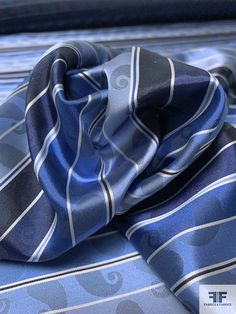 SKU: 16101 Content: 100% Silk Color: Shades of Blue / White Width: 40 inches Fitted Blue Silk Tie, Blue Silk Neckwear For Formal Occasions, Formal Blue Silk Neckwear, Blue Silk Ties For Business, Blue Silk Neckwear With Ties, Blue Satin Ties For Formal Occasions, Formal Blue Satin Ties, Dubai Hills, Blue And White Fabric