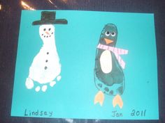 two children's handprints depicting penguins with hats and scarves