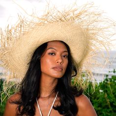 Meet Catalina, the timeless beauty, with an edge. Made entirely of straw, this mesmerizing sun hat has a wide brim and a frayed edge. Thoughtfully made by artisan communities in Java, from locally harvested straws. Wear it like a crown - with your resort dresses and swimsuits for a perfect romantic getaway.  Composition: 100% straws Main brim diameter: around 15 inches Made by artisan communities in Java Spot clean Lay flat & air dry Ethical Fashion Brands, Resort Dresses, Romantic Getaway, Artisan Gift, Women Artisans, Mens Jewelry Bracelet, Romantic Getaways, Independent Designers Fashion, Ethical Fashion