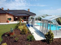 a house with a swimming pool in the backyard