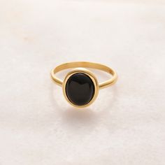 "\"Minimalist Black Onyx Ring - Exquisite Black Onyx Ring\" Elevate your style with this extraordinary Black Onyx ring, designed to captivate and leave a lasting impression. Crafted with precision, this statement piece showcases a genuine Black Onyx gemstone, renowned for its deep, mysterious allure. Key Features: - Genuine Black Onyx: This ring features a stunning, high-quality Black Onyx stone that exudes elegance and sophistication. - Unique Design: Our expert artisans have meticulously craft Classic Black Cabochon Rings, Black Cabochon Ring As A Gift, Black Cabochon Ring For Gift, Onyx Cabochon Rings, Onyx Cabochon Round Rings, Round Onyx Cabochon Rings, Anniversary Black Cabochon Rings, Black Enamel Onyx Round Rings, Oval Black Enamel Ring