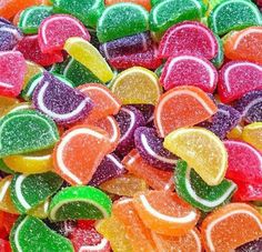 a pile of colorful candies sitting on top of each other