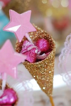 pink and gold cones with stars on them