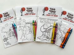 four coloring books with colored crayons in them on a white surface, each containing an image of a cowboy and the words happy birthday logan