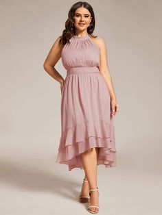 Shine at any wedding with our Plus Size Glittery Sleeveless Halter Neck Midi Wedding Guest Dress. This stunning dress features a glittery fabric that adds a touch of glamour, a chic halter neckline, and a flattering sleeveless design. The midi length offers elegance and comfort, making it perfect for curvy figures. Ideal for wedding celebrations, this dress ensures you look and feel radiant. Fit: Please refer to size chart. Length: Knee Length. Sleeve Style: Sleeveless. Closure: It is concealed Glamorous Sleeveless Halter Dress For Prom Season, Halter Neck Sleeveless Dress For Prom, Glamorous Halter Neck Wedding Dress, Fitted Halter Neck Bridesmaid Dress, Midi Wedding Guest Dress, Halter Neck Midi Dress, Elegant Midi Dresses, Dusty Rose Dress, Guest Attire