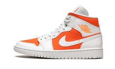 White/orange leather/rubber Air Jordan 1 MID SE sneakers from JORDAN featuring signature Air Jordan Wings logo, signature Swoosh logo detail, contrasting panel detail, round toe, front lace-up fastening, logo patch at the tongue, ankle-length and rubber sole.  These styles are supplied by a premium sneaker marketplace.  Stocking only the most sought-after footwear, they source and curate some of the most hard to find sneakers from around the world. . Womens Air Jordan 1, Orange Jordan, Womens Air Jordan, Wmns Air Jordan 1, Jordan Yeezy, Jordan Ones, Air Jordan 1 Mid Se, Nike Air Jordan 1 Mid, Womens Air Jordans