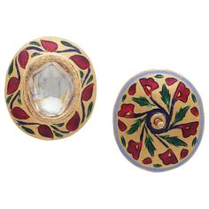 A pair of beautiful Flat diamond earring with enamel all around and at the back. The intricate enamel work called "meenakari" in Hindi in all done by hand by our skilled artisans. The work around the diamond is inspired by the creepers that grow on the wall and the back is also floral motif along the same lines. The Flat Diamonds are called "Polki" and are set in the piece with "Kundan" which is pure gold. This technique of setting gems with pure gold can be seen in work from centuries ago too. Ceremonial Meenakari Enamel Jewelry, Meenakari Enamel Jewelry, Traditional Hand Painted Enamel Jewelry, Traditional Hallmarked Enamel Jewelry, Traditional Enamel Jewelry With Inlay, Traditional Oval Cabochon Earrings, Traditional Yellow Gold Enamel Earrings, Traditional White Enamel Earrings, Traditional White Hand Painted Earrings