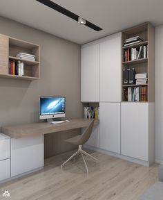 a room with a desk, bookshelves and a computer monitor on top of it