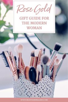 the rose gold gift guide for the modern woman is on display in a vase with makeup brushes