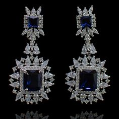 For edgy style and sophisticated sparkle, this pair is a dream come true! Elegant and shimmering pair with CZ and sapphire stones creating a flawlessly fresh finish for each and every one of your evening ensembles. Approximate earrings length is 2.1". Designed over a high-quality brass as base metal. Available in 3 plating options. Made by order. Kindly allow 4-6 weeks for the delivery of this item. For custom or urgent requests, please contact support@alacouture.com. *Please Note: We use faux s Unique Gift Cards, Earrings Sapphire, Pink Emerald, Sapphire Stones, Heritage Jewellery, Bollywood Jewelry, Pakistani Jewelry, Cz Necklace, Edgy Style