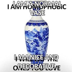 a blue and white vase with the words i am nonformnalic vase, i am nice and decorative