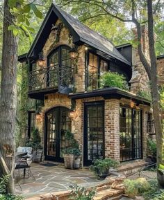 a very nice looking house in the woods