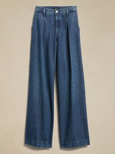 Denim with a twist, this exaggerated wide-leg style is inspired by classic tailored trousers with a high waist and deep pleats, made from sumptuously soft denim woven from organic cotton.  ULTRA WIDE-LEG FIT: High-waisted.  Tailored for the at-ease f Relaxed Fit Medium Wash Wide Leg Pants For Work, Relaxed Fit Denim Wide Leg Work Pants, Classic Indigo Wide Leg Bottoms, Relaxed Fit Denim Wide Leg Pants For Work, Dark Wash Wide Leg Pants For Work, Medium Wash Full Length Wide Leg Work Pants, Medium Wash Full Length Wide Leg Pants For Work, Indigo Wide Leg Jeans For Work, Chic Medium Wash Wide Leg Pants For Work