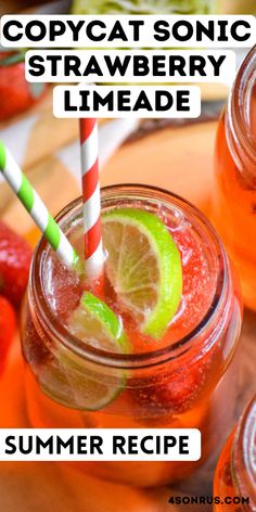 two mason jars filled with strawberries and limeade