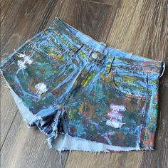 Nwot Brand New Never Worn Levi’s Furst Of S King 6 Missy Shorty Shorts! Artsy Painted Floral Like Print All Over Amazing And On Trend! Waist 15” Across Rise 9” Inseam 2” Trendy Blue Levi's Jean Shorts, Trendy Levi's Blue Jean Shorts, Levi's Blue Jean Shorts For Summer, Multicolor Summer Jean Shorts, Levi's Summer Cotton Shorts, Blue Levi's Jean Shorts, Multicolor Cotton Cutoff Bottoms, Levi's Fitted Summer Shorts, Casual Purple Jean Shorts For Summer